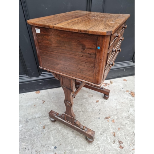 1052 - An early Victorian rosewood work table, 50cm wide.