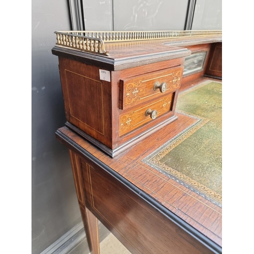 1053 - A late 19th century rosewood and inlaid bonheur du jour, 106cm wide.