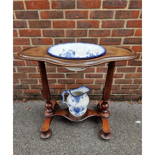 1061 - A Victorian mahogany washstand, with blue & white pottery jug and basin, 88cm wide.... 