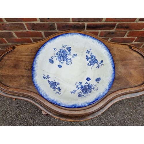 1061 - A Victorian mahogany washstand, with blue & white pottery jug and basin, 88cm wide.... 