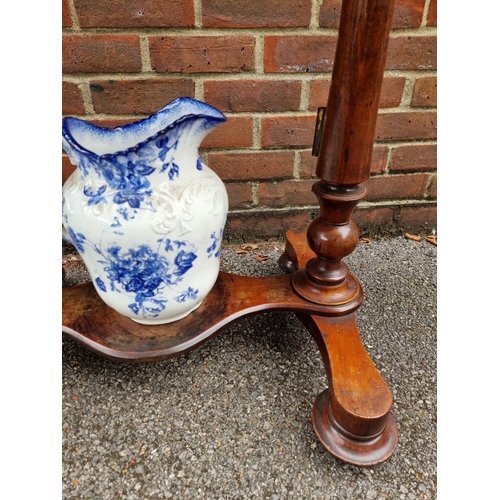 1061 - A Victorian mahogany washstand, with blue & white pottery jug and basin, 88cm wide.... 