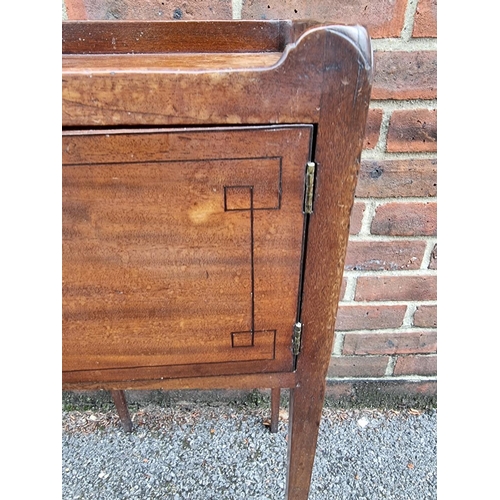 1074 - A Regency mahogany and line inlaid pot cupboard, 35cm wide.