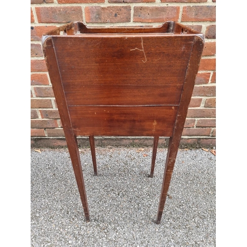 1074 - A Regency mahogany and line inlaid pot cupboard, 35cm wide.