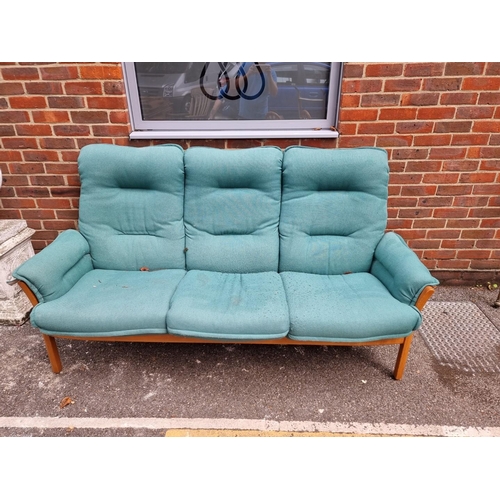 1084 - An Ercol 'Saville' elm three seater settee.  