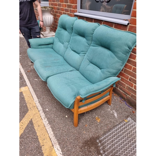 1084 - An Ercol 'Saville' elm three seater settee.  