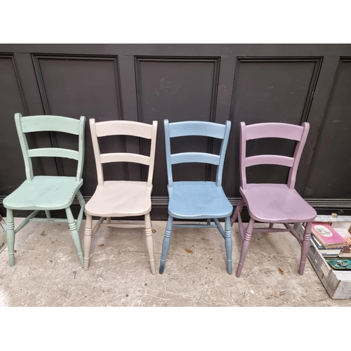 1088 - A set of four old painted bar back kitchen chairs. 