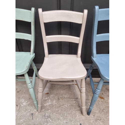 1088 - A set of four old painted bar back kitchen chairs. 