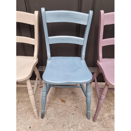 1088 - A set of four old painted bar back kitchen chairs. 