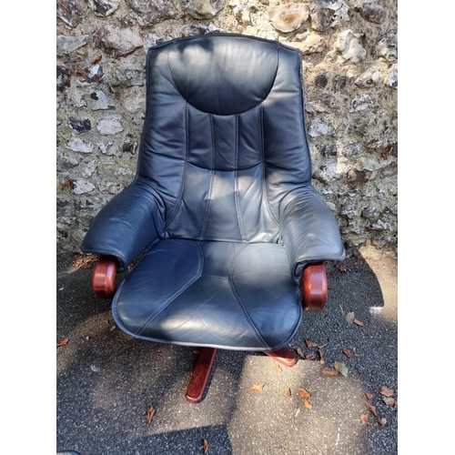 1093 - A Stressless blue leather occasional chair and footstool.