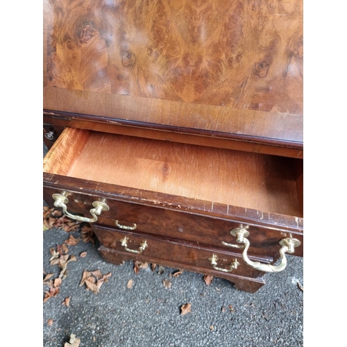 1099 - A small reproduction walnut bureau, 53cm wide; together with a Victorian mahogany bedside cupboard, ... 