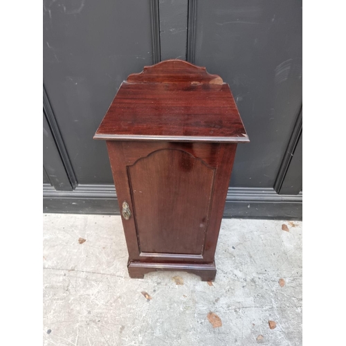 1099 - A small reproduction walnut bureau, 53cm wide; together with a Victorian mahogany bedside cupboard, ... 