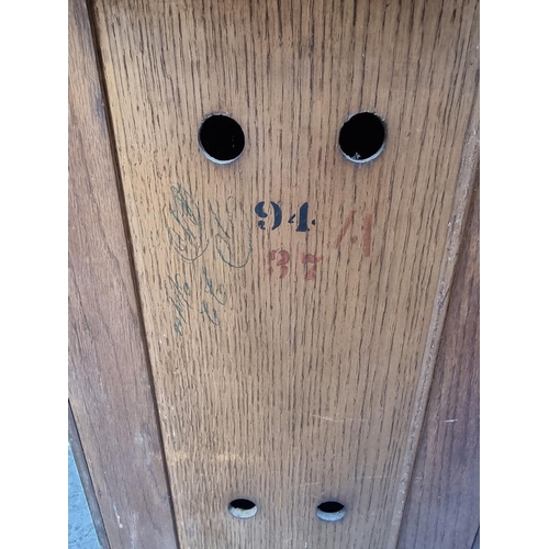 1099 - A small reproduction walnut bureau, 53cm wide; together with a Victorian mahogany bedside cupboard, ... 