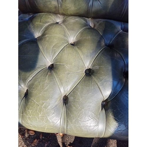 1108 - A pair of reproduction green buttoned leather and beech Gainsborough chairs.