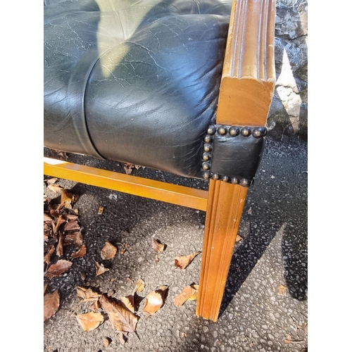 1108 - A pair of reproduction green buttoned leather and beech Gainsborough chairs.