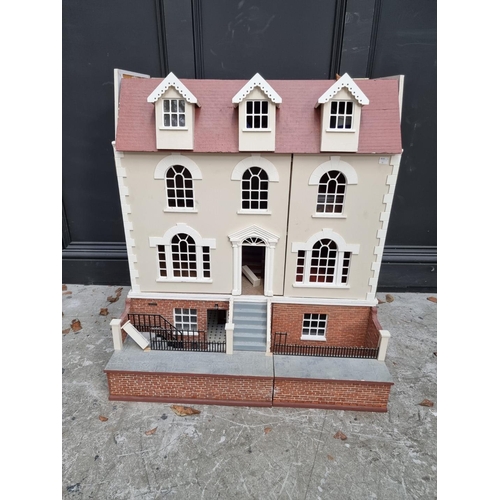 1109 - A large Georgian style doll's house and contents, 84cm high x 75.5cm wide.