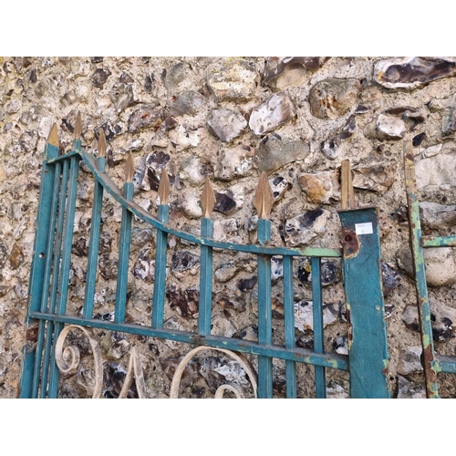 1112 - An old pair of painted wrought iron gates, 197cm x 214cm; together with another smaller matching gat... 