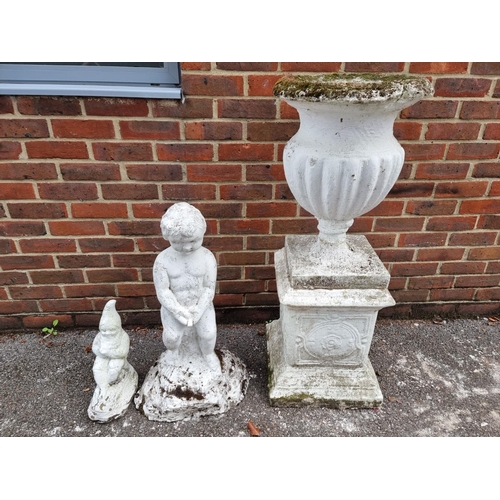 1115 - An old white painted composition stone campana urn and pedestal, 109cm high; together with a figural... 