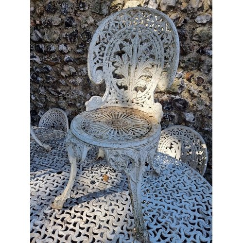 1116 - A white painted aluminium garden table and five chairs, the table 181cm wide.