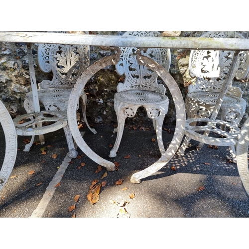 1116 - A white painted aluminium garden table and five chairs, the table 181cm wide.