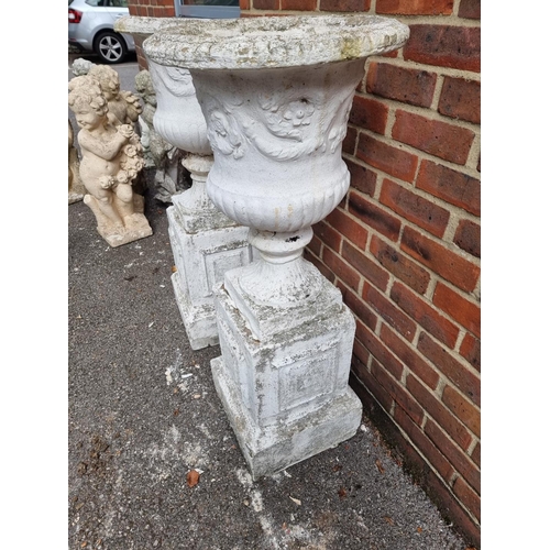 1120 - A pair of white painted composition stone Campana urns and pedestals, 109cm high.