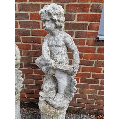 1121 - A pair of old painted and weathered composition stone cherub and dolphin figures, on pedestals, 128c... 