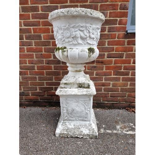 1124 - A white painted composition stone Campana urn and pedestal, 110cm high.