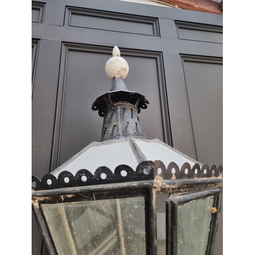 1125 - An old painted cast iron street lamp, 220cm high.