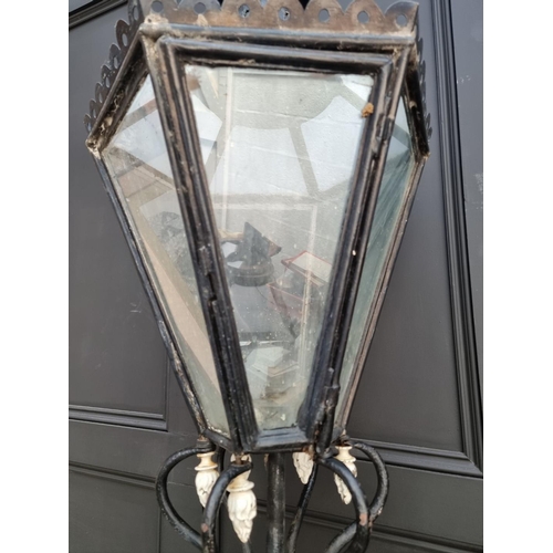 1125 - An old painted cast iron street lamp, 220cm high.