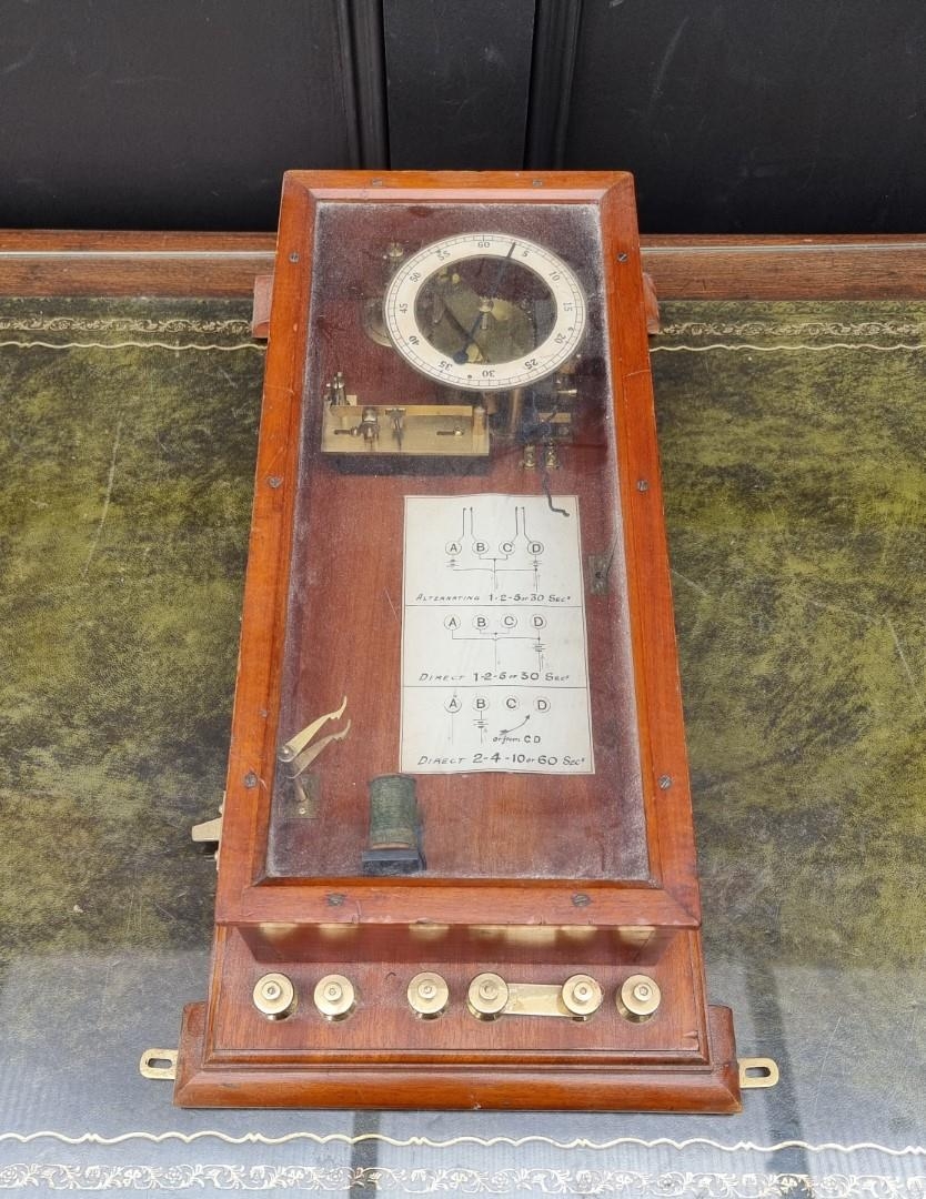 An antique mahogany cased laboratory timer,