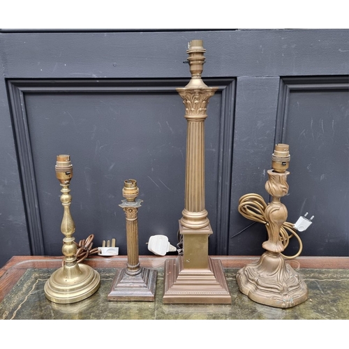 1158 - Four brass table lamps, to include two Corinthian column examples, total height of largest 48cm.... 