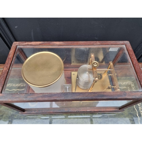 1178 - An oak cased barograph, by Sinclair, London, 29.5cm wide.