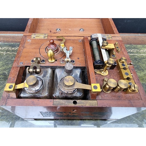 1179 - A vintage mahogany cased electro-shock machine, indistinctly inscribed, 19cm wide.