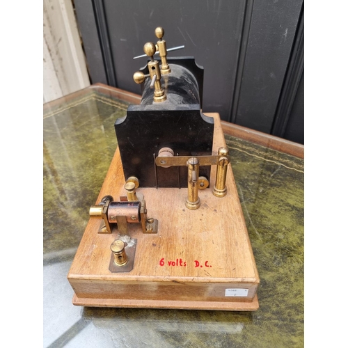 1183 - An old induction coil, 39cm wide; together with an old spit jack mechanism.