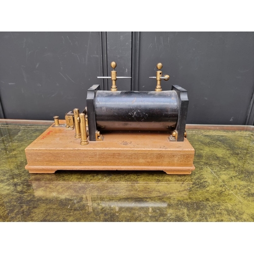 1183 - An old induction coil, 39cm wide; together with an old spit jack mechanism.