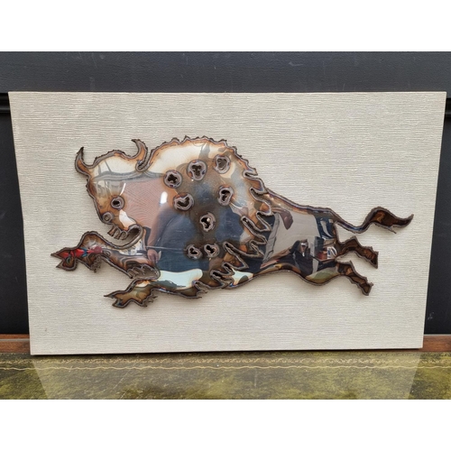 1149 - A sheet metal bull, on mount, the whole 43 x 68.5cm. 