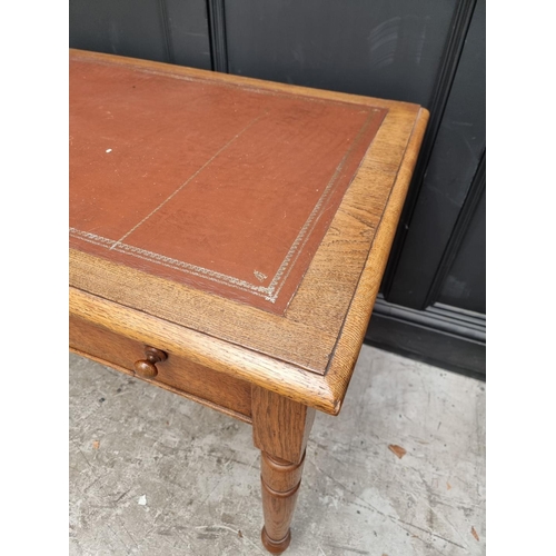 1019 - A Victorian oak two drawer desk, 122.5cm wide. 