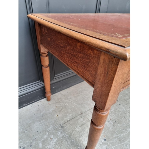 1019 - A Victorian oak two drawer desk, 122.5cm wide. 