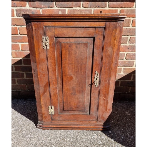 1095 - A George III oak hanging corner cupboard, 89.5 x 84cm; together with a reproduction mahogany and bra... 