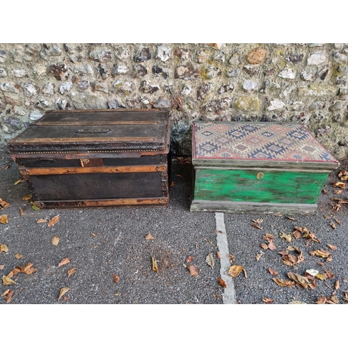 1101 - An old green painted chest, with hinged and upholstered top, 71cm wide; together with another canvas... 