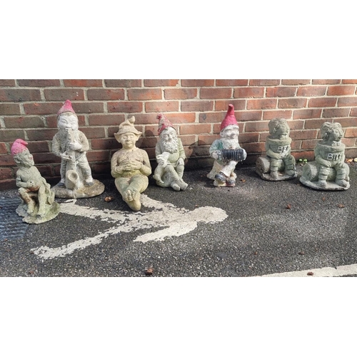 1114 - Five composition stone gnomes, largest 53.5cm high; together with a pair of 'Bill & Ben' example... 