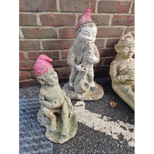 1114 - Five composition stone gnomes, largest 53.5cm high; together with a pair of 'Bill & Ben' example... 