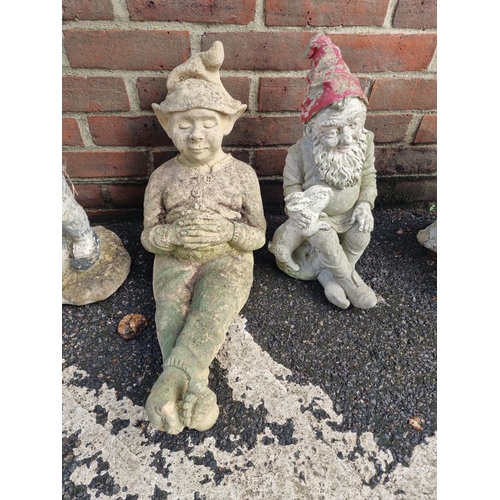 1114 - Five composition stone gnomes, largest 53.5cm high; together with a pair of 'Bill & Ben' example... 