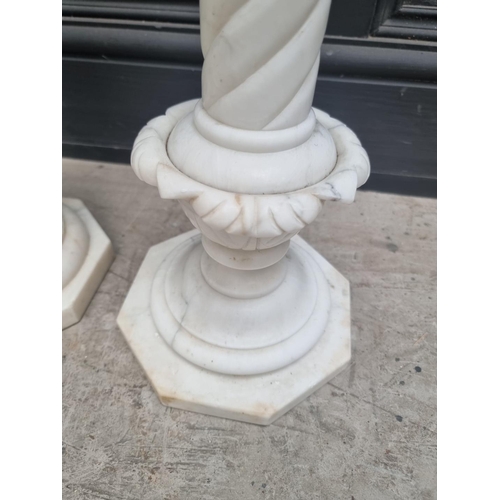 1332 - A near pair of white marble pedestals, 62cm high.