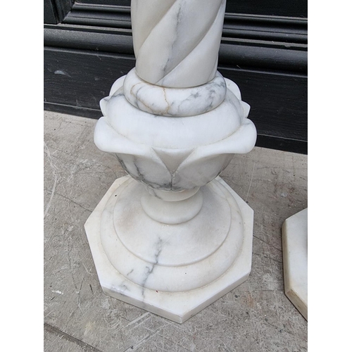 1332 - A near pair of white marble pedestals, 62cm high.