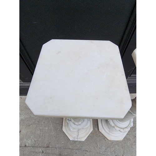 1332 - A near pair of white marble pedestals, 62cm high.