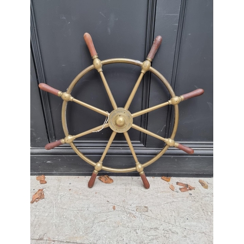 1351 - A small brass antique ship's wheel, by Brown Bros & Co Ltd, Edinburgh, 76.5cm diameter. ... 