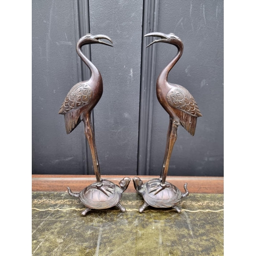 1364 - A pair of Japanese bronze crane and tortoise figure groups, 26cm high. 