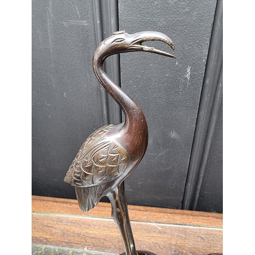 1364 - A pair of Japanese bronze crane and tortoise figure groups, 26cm high. 