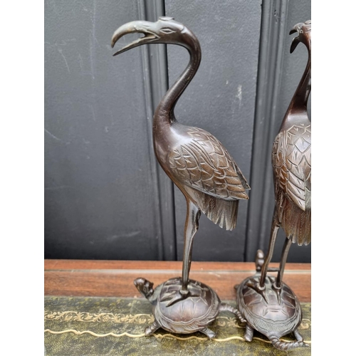 1364 - A pair of Japanese bronze crane and tortoise figure groups, 26cm high. 