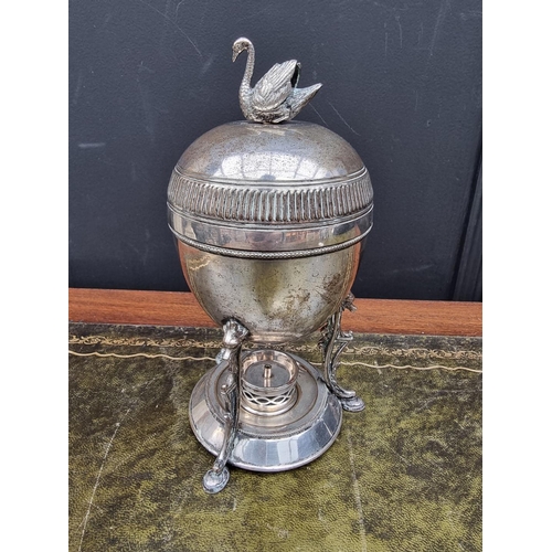 1367 - An electroplated egg coddler, 23cm high. 